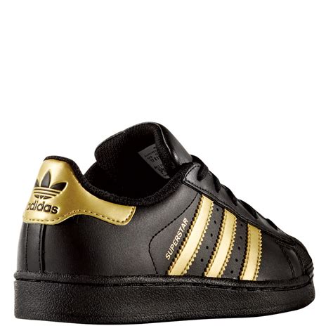 adidas schuhe kinder schwarz gold|Schwarz .